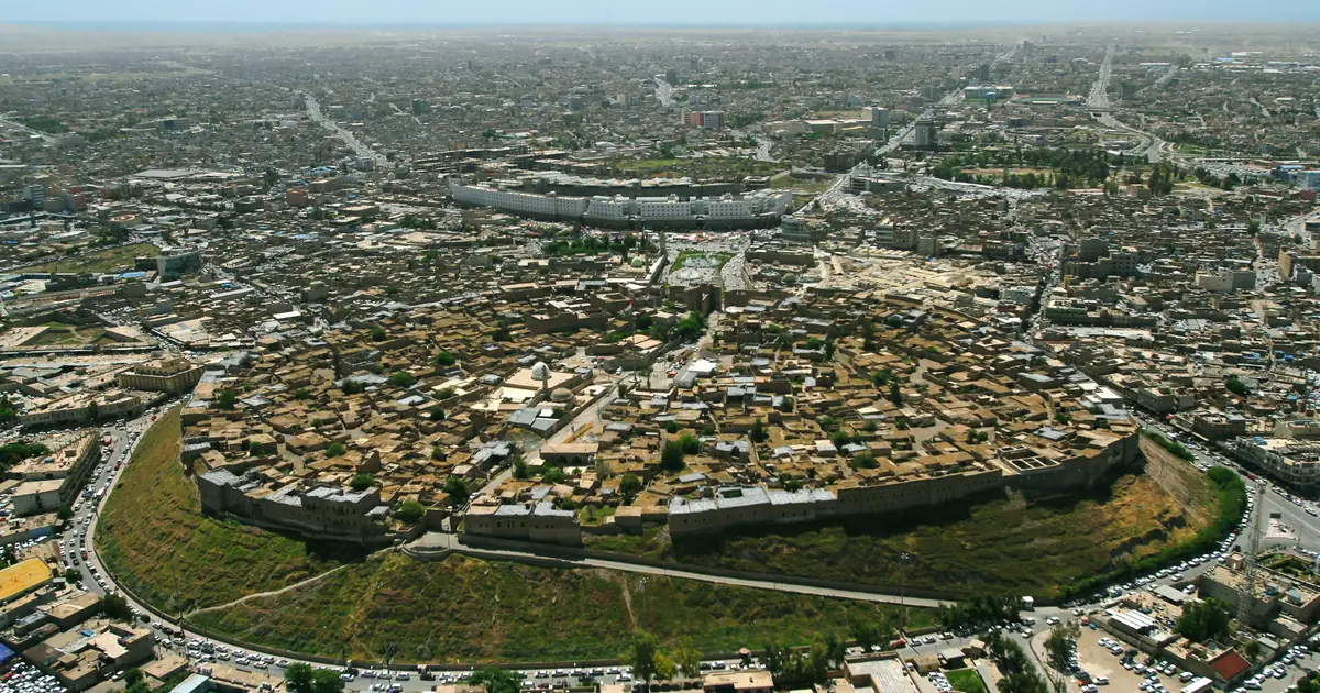 The historic Erbil Citadel rising above the modern city in Iraq