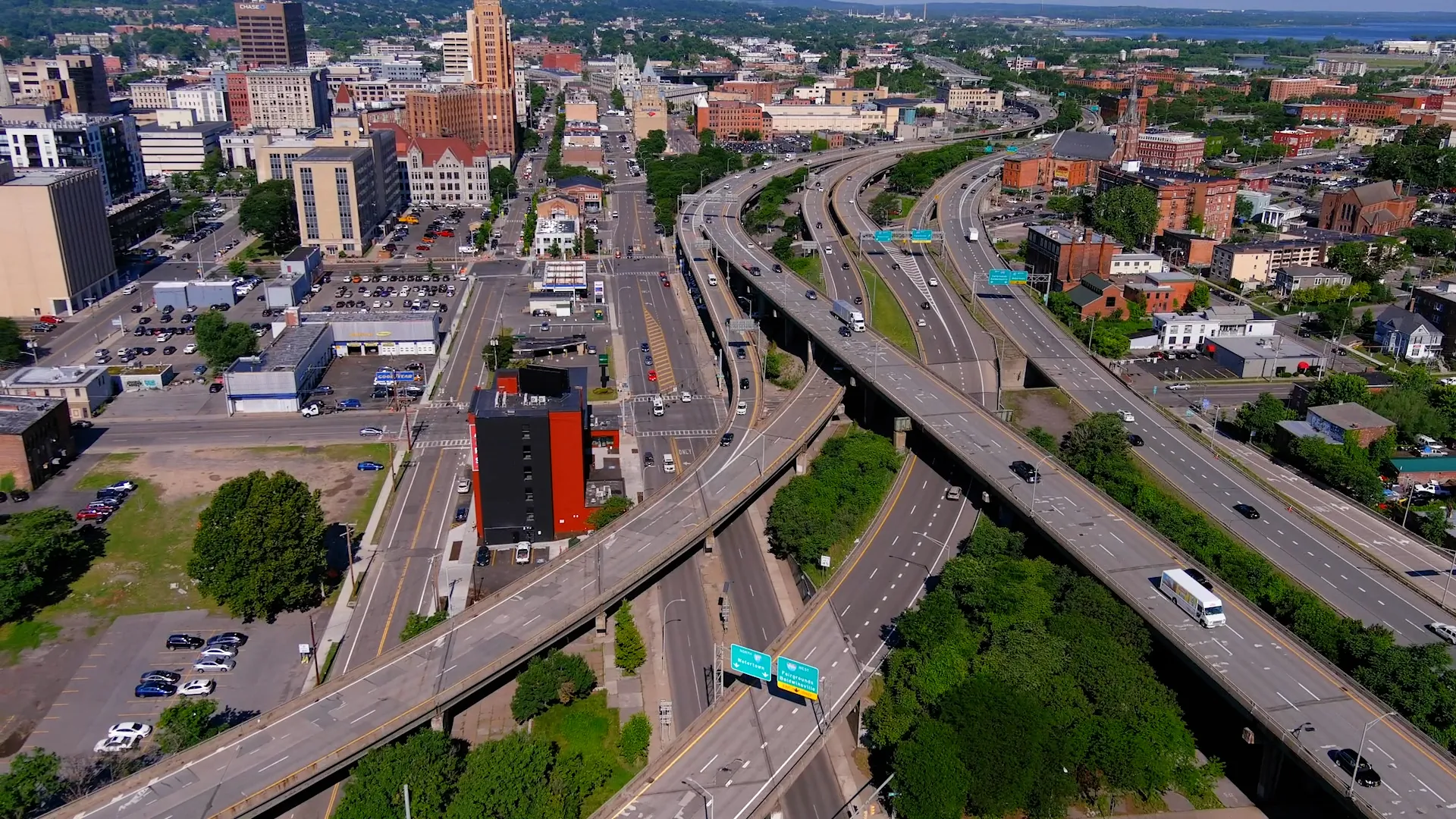 Aerial view of the elevated I-81 viaduct cutting through Syracuse neighborhoods