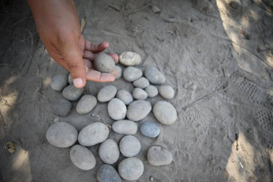 Round stone sling projectiles excavated at Troy and arranged on the ground