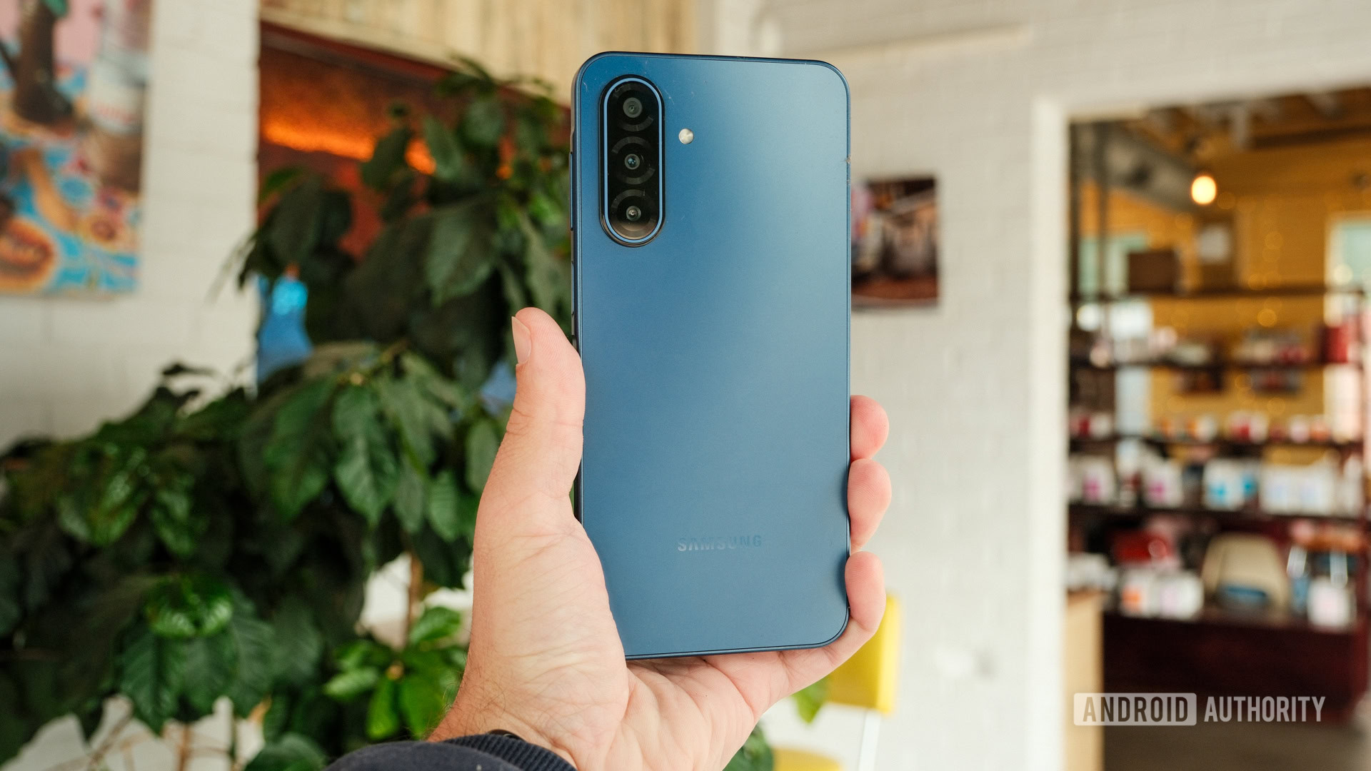 Samsung Galaxy A17 5G held in hand with the front display visible