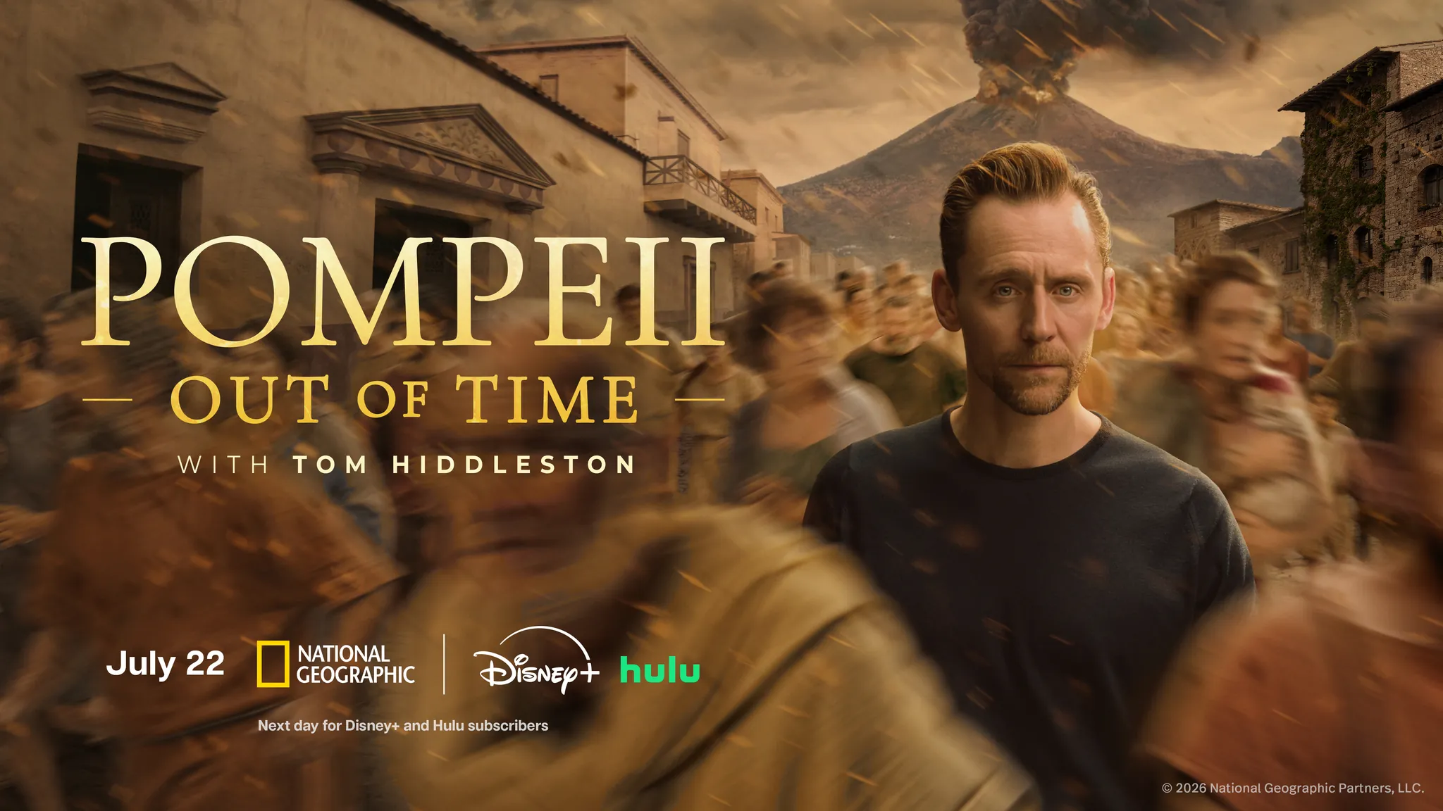 Tom Hiddleston standing before Pompeii ruins and Mount Vesuvius in key art for Pompeii: Out of Time