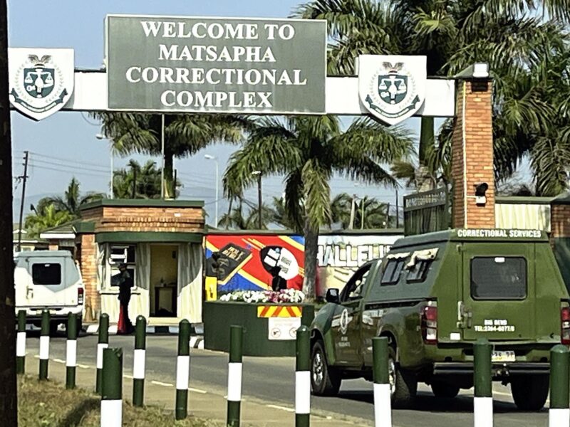 Exterior view of Matsapha Correctional Centre in Eswatini with perimeter walls and security gate