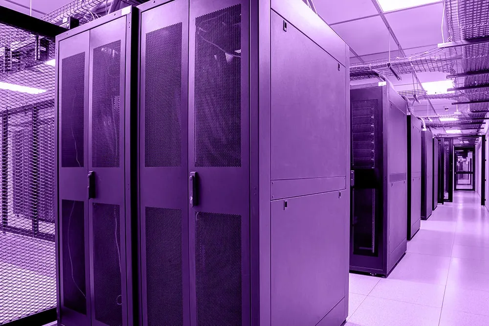 Rows of server racks inside an African data center colocation facility