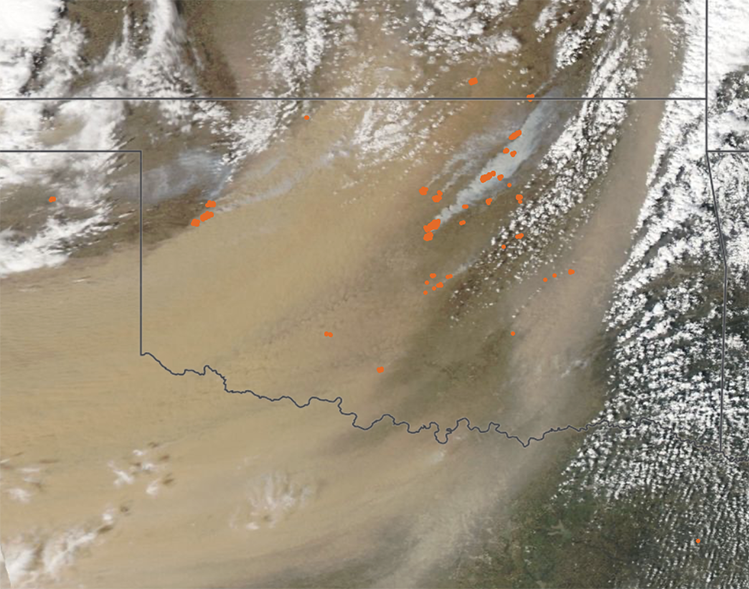 Satellite image showing a tan dust plume sweeping from Texas and Oklahoma toward the central United States