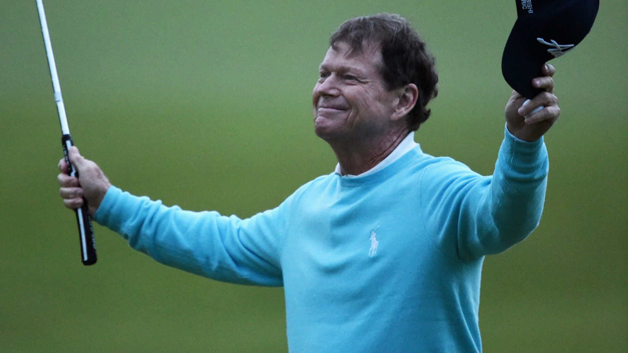 Tom Watson walking on a windy links fairway during an Open Championship